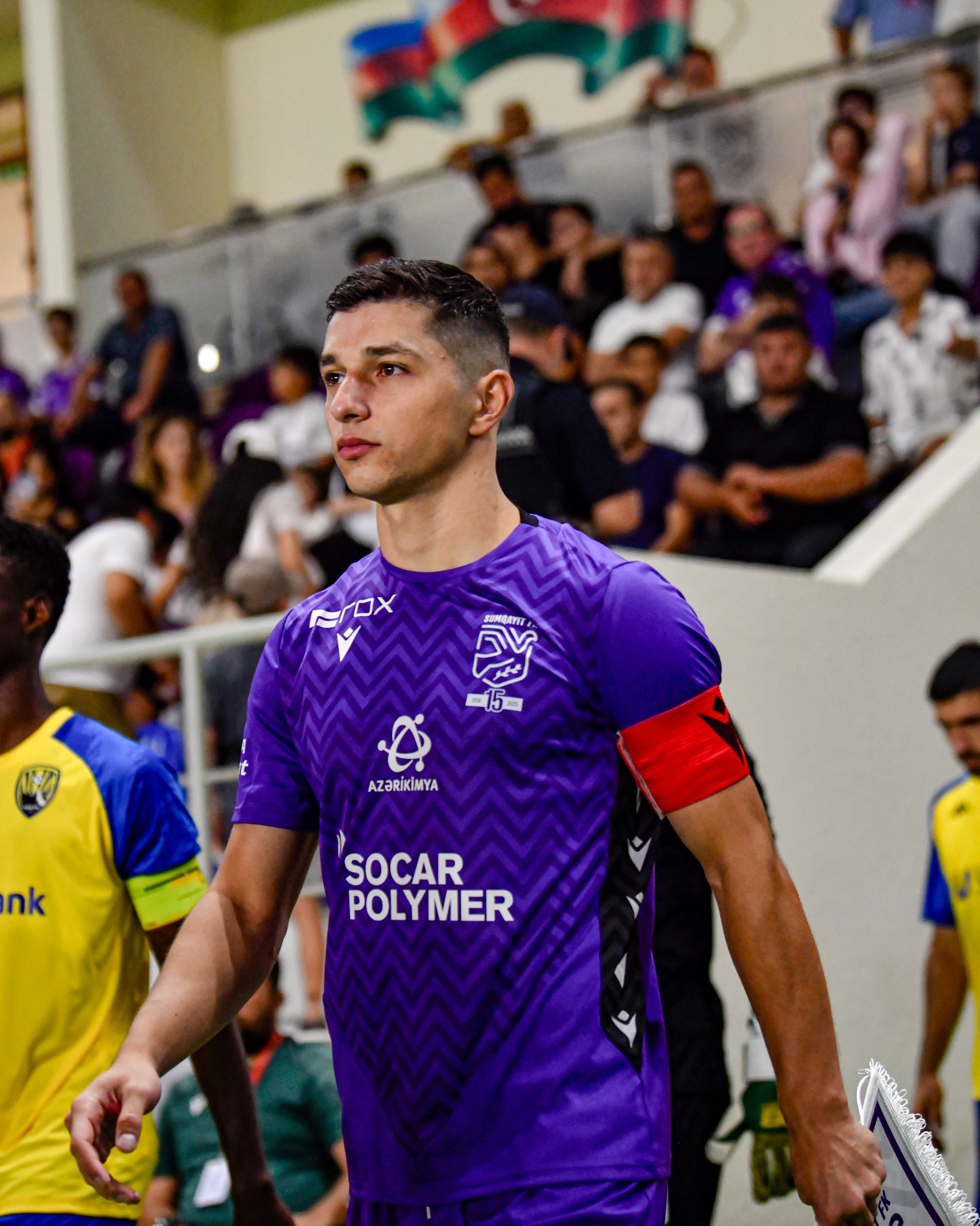 Sabuhi Abdullazada in purple kit with a red captain armband